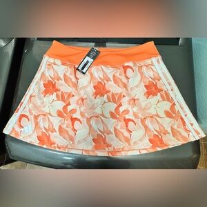 New adidas women’s M Medium floral 15” inch golf skirt orange colo